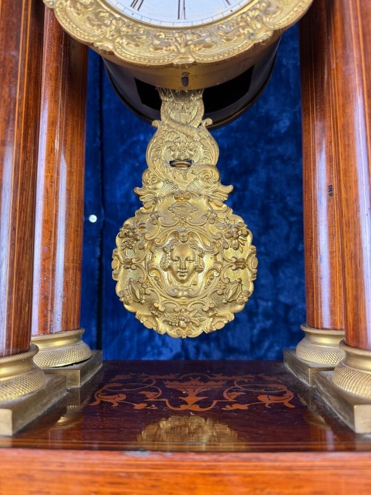 Napoleon III period portico clock in marquetry and gilded bronzes