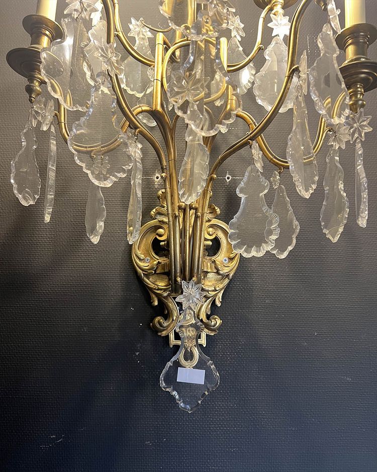 Paire d’appliques en bronze doré et verre taillé