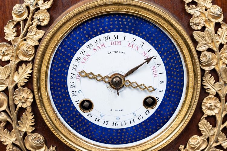 Maison Balthazard mahogany ormolu cherub clock enamel dial