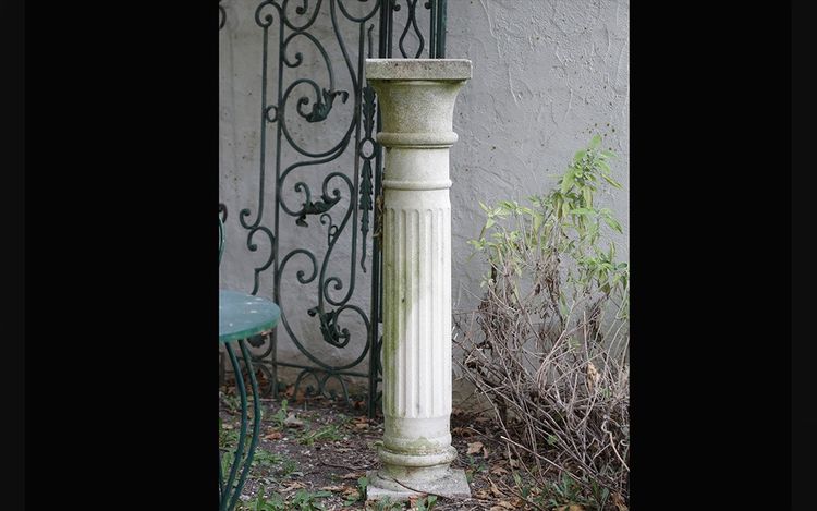 Column in reconstituted stone