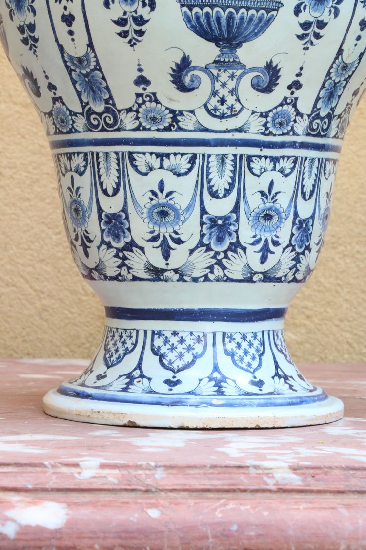 Set of three Rouen earthenware vases