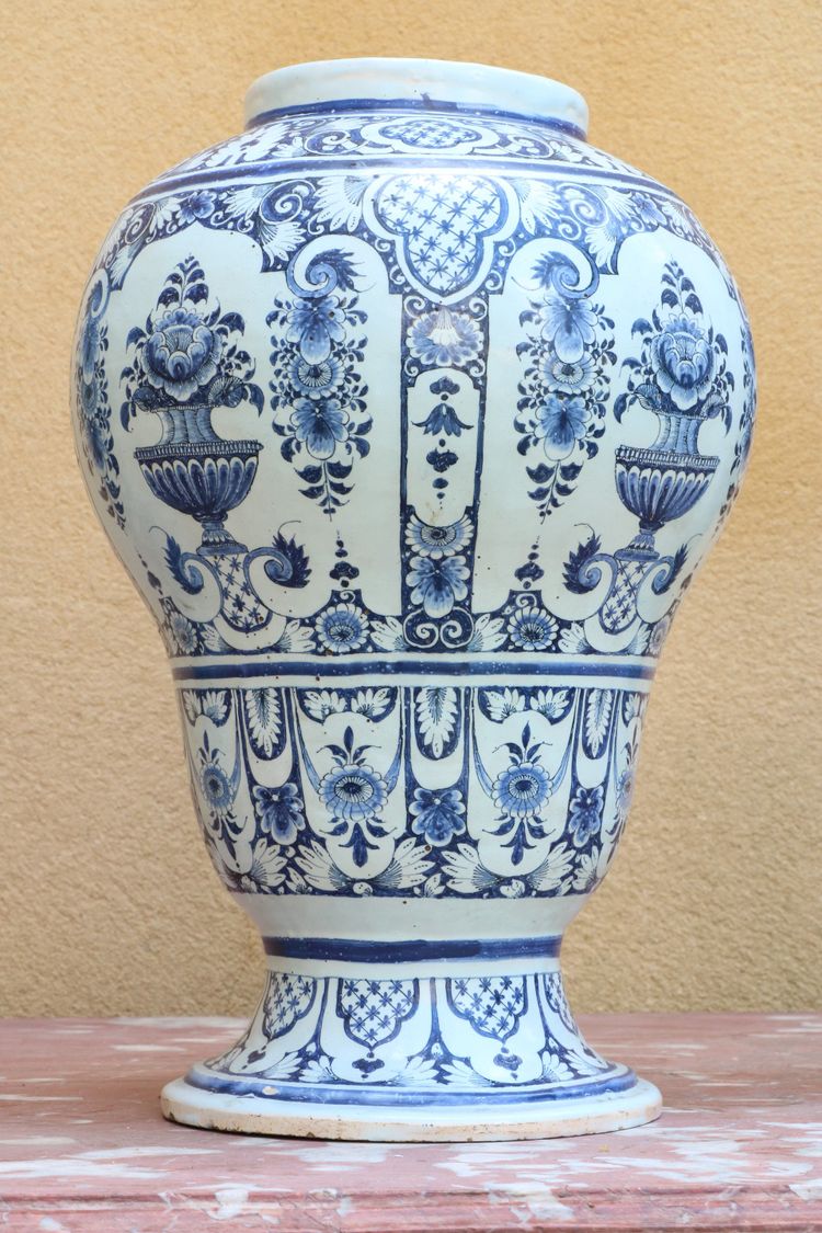 Set of three Rouen earthenware vases