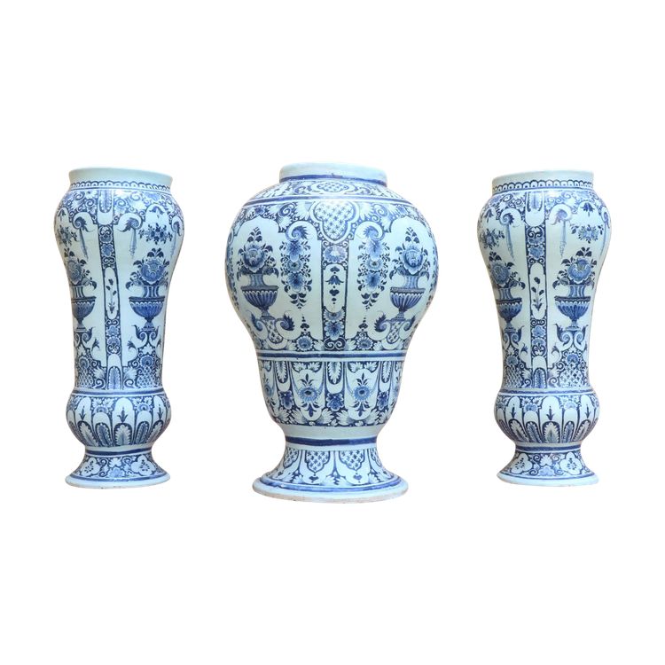 Set of three Rouen earthenware vases