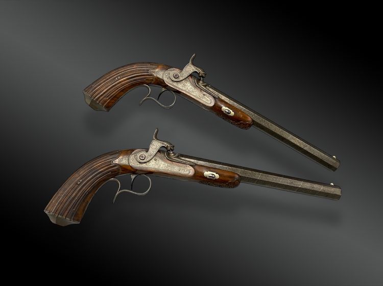 Box containing a PAIR OF PISTOLS signed LASSENCE - RONGE A LIEGE Belgium - XIXth century