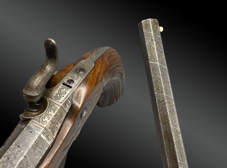 Box containing a PAIR OF PISTOLS signed LASSENCE - RONGE A LIEGE Belgium - XIXth century
