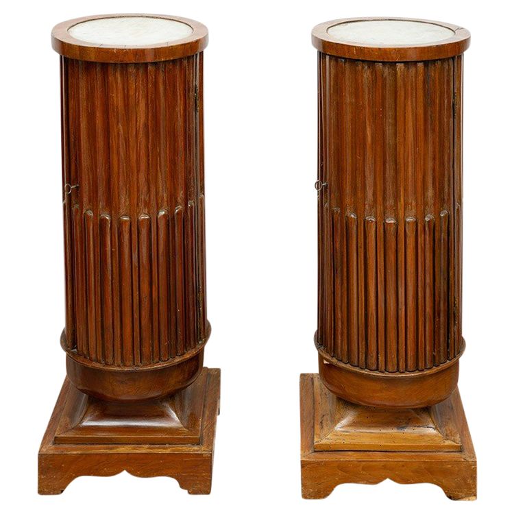 Pair of antique cherry columns with white marble top. Naples, 19th century.
