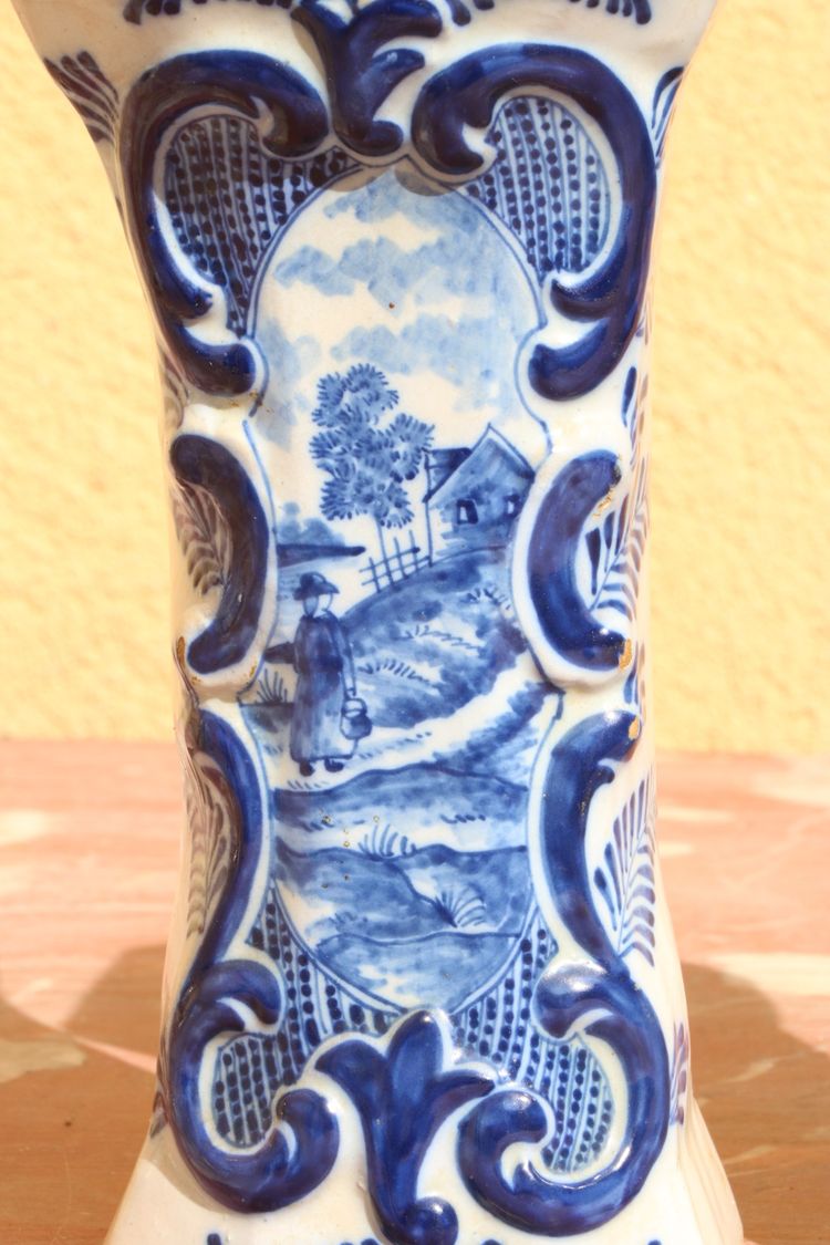 Set of three Rouen earthenware vases