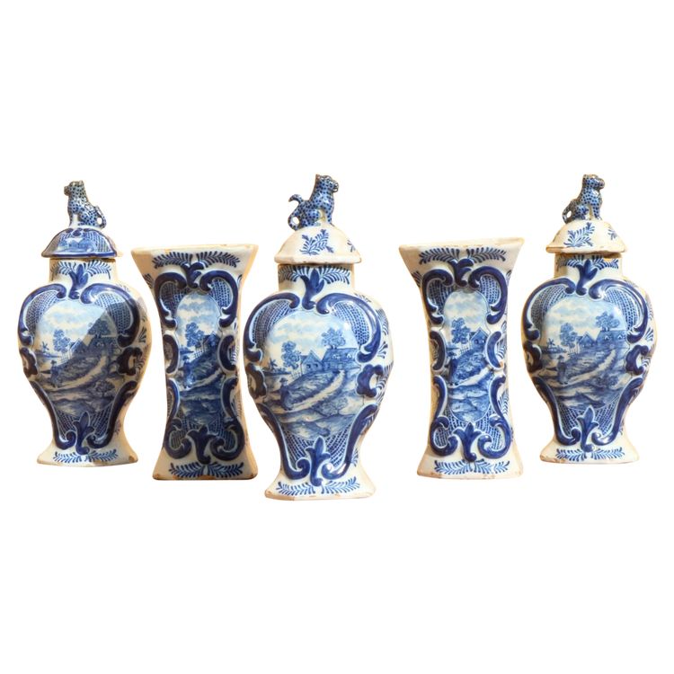 Set of three Rouen earthenware vases
