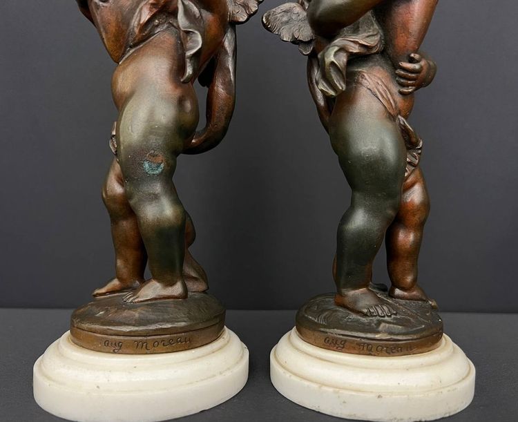 Pair of patinated bronze figures - Winged putti with amphorae, signed Aug. Moreau, circa 1900