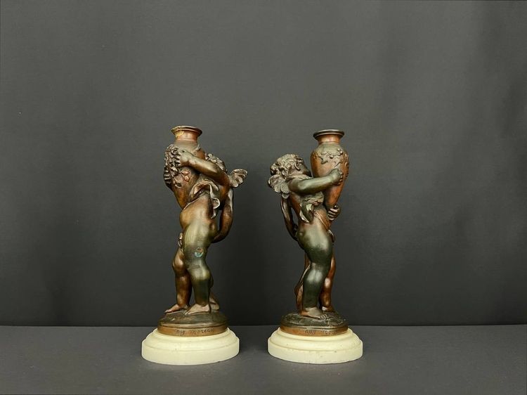 Pair of patinated bronze figures - Winged putti with amphorae, signed Aug. Moreau, circa 1900