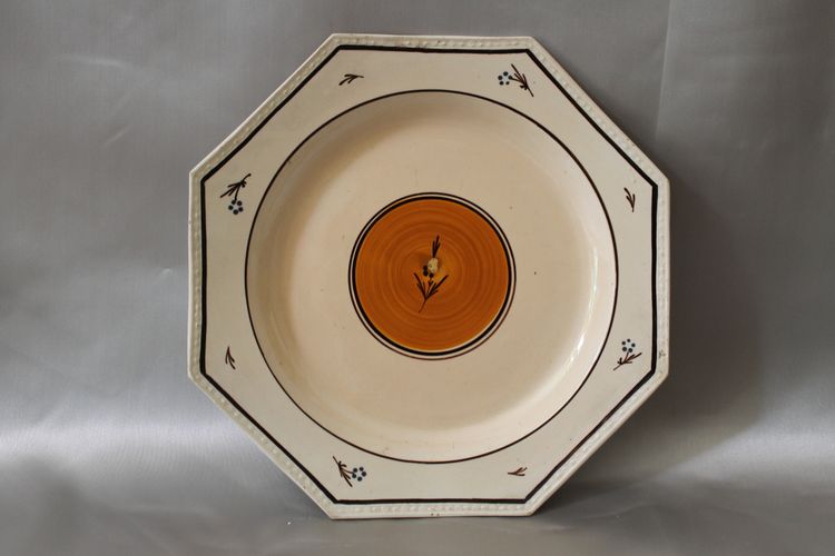 Pair of Nevers earthenware ocotogonal beaded plates signed Dubois 18th century