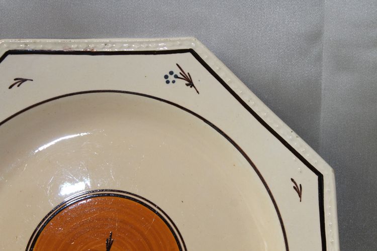 Pair of Nevers earthenware ocotogonal beaded plates signed Dubois 18th century