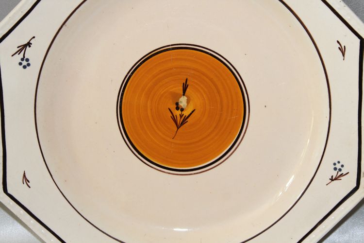 Pair of Nevers earthenware ocotogonal beaded plates signed Dubois 18th century