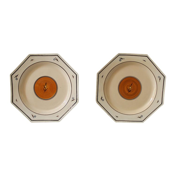 Pair of Nevers earthenware ocotogonal beaded plates signed Dubois 18th century