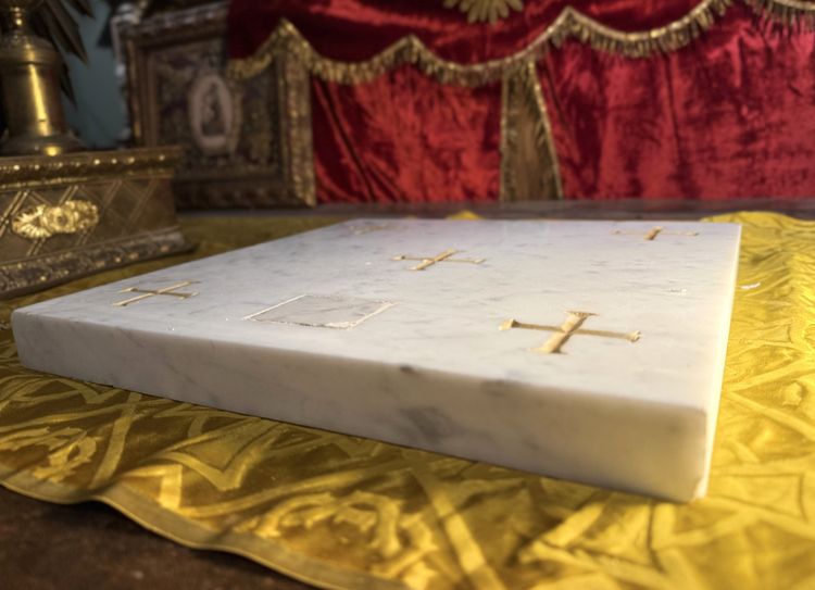 Marble altar stone and relic