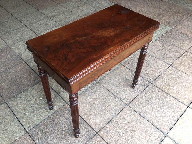 A 19th-century mahogany games table