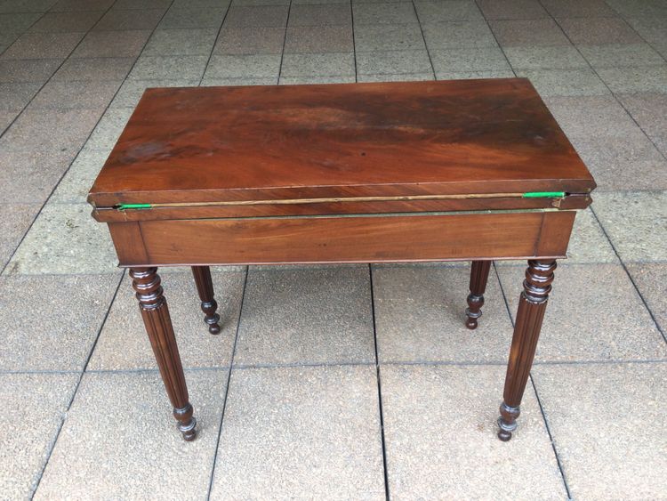A 19th-century mahogany games table
