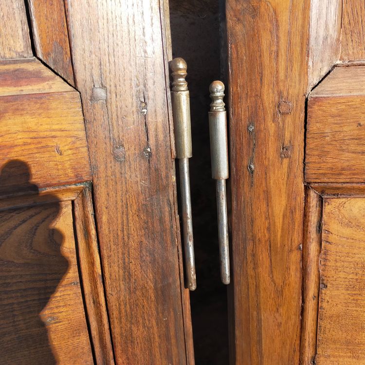 Two antique oak cornerboards curved cupboard doors