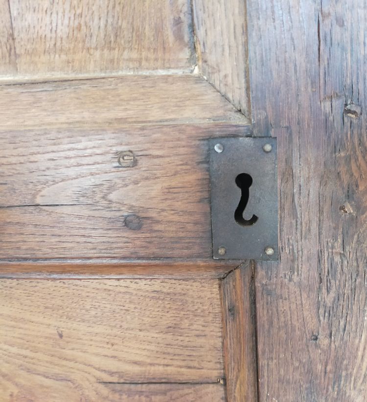 Two antique oak cornerboards curved cupboard doors