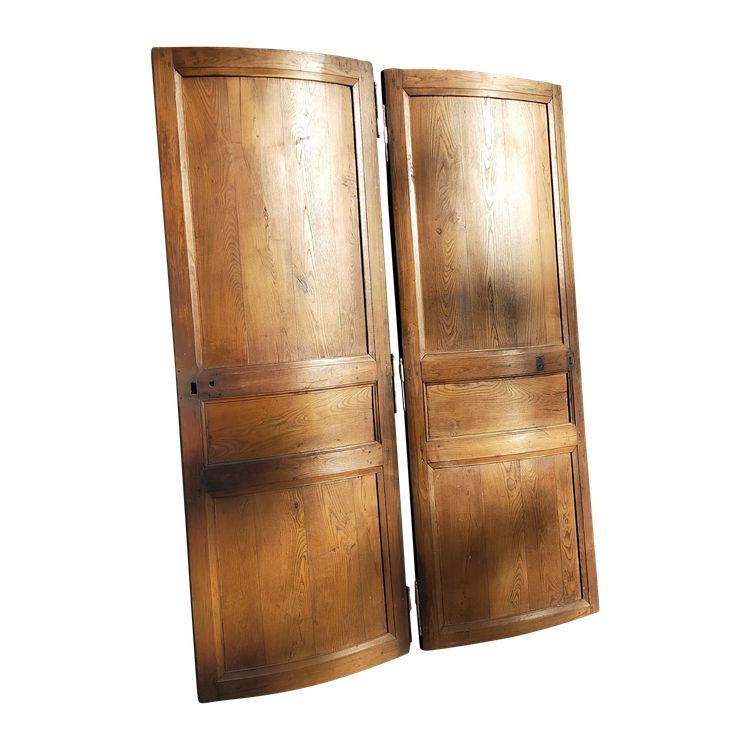 Two antique oak cornerboards curved cupboard doors