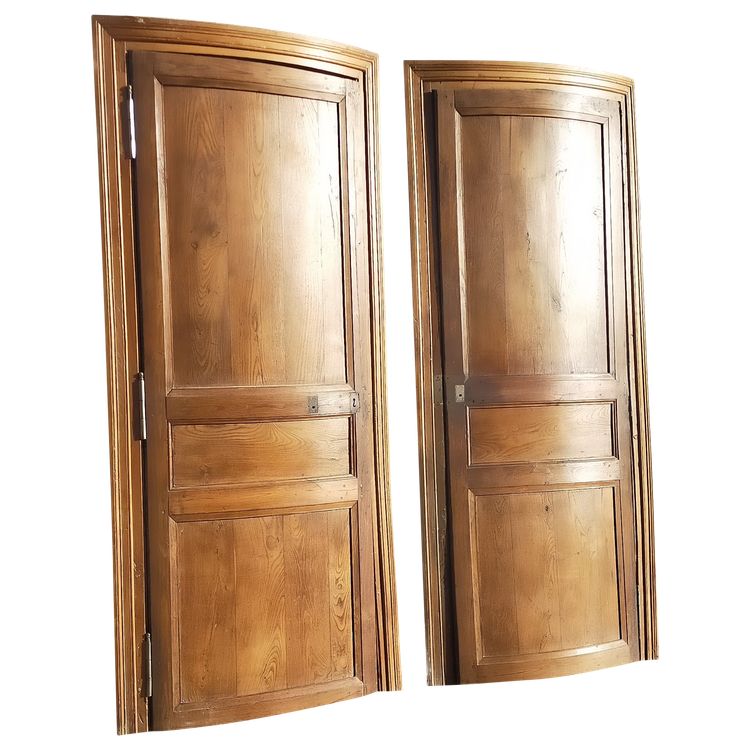 Two antique oak cornerboards curved cupboard doors