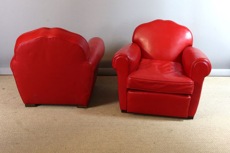 Paire de fauteuils club en cuir