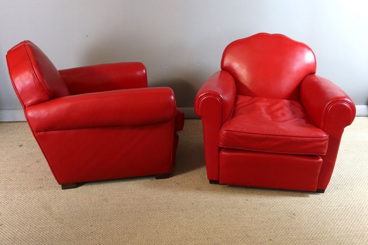 Paire de fauteuils club en cuir