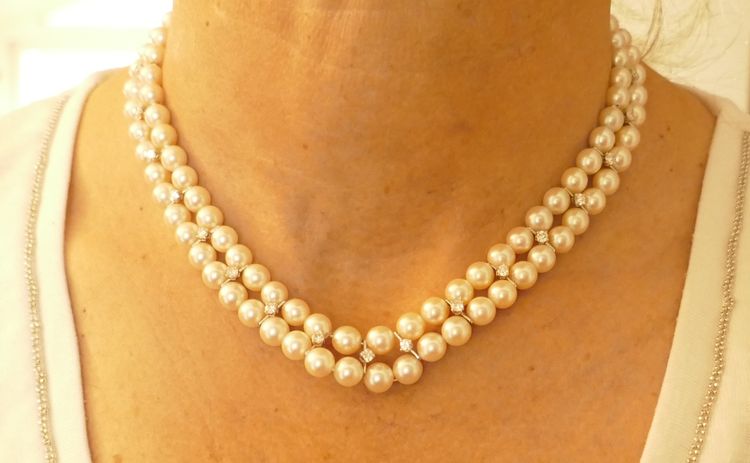 Double strand of pearls and diamonds 1.70 carat.