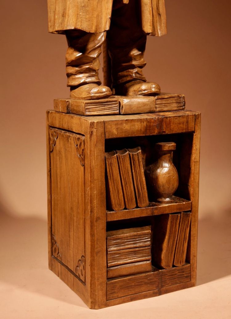 An amusing sculpture of a Ukrainian bibliophile/bookworm.