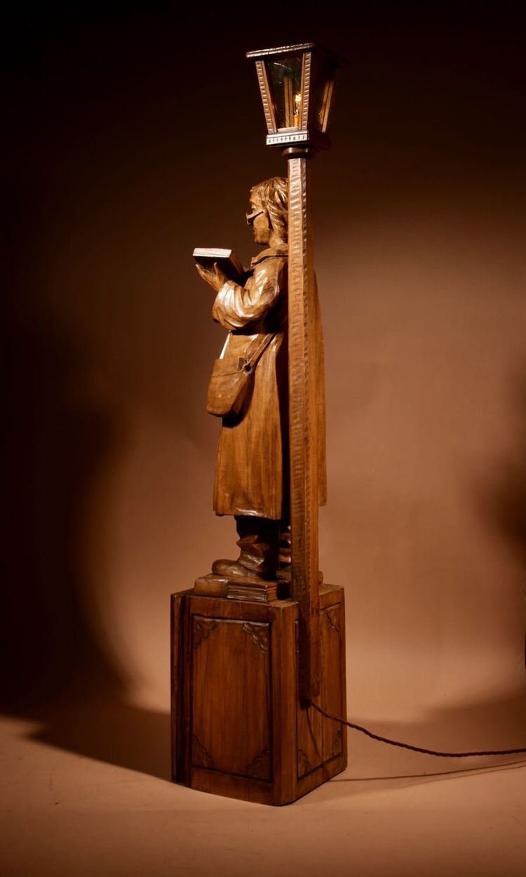 An amusing sculpture of a Ukrainian bibliophile/bookworm.