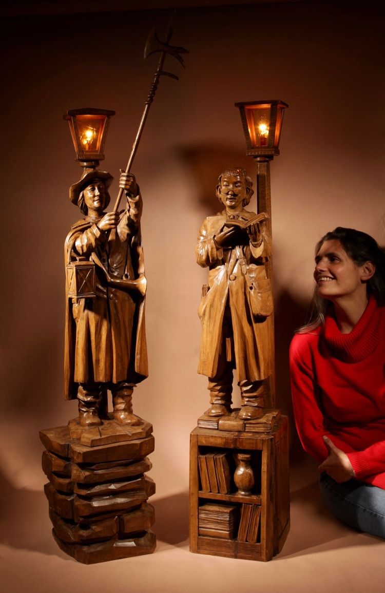 An amusing sculpture of a Ukrainian bibliophile/bookworm.