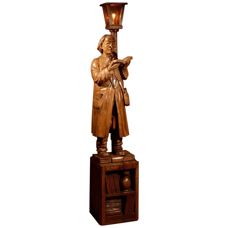 An amusing sculpture of a Ukrainian bibliophile/bookworm.