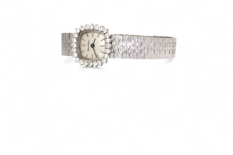 Orologio in oro e diamanti 1960