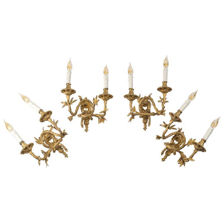 Set of four Chiseled Bronze two-light sconces Italy circa 1850