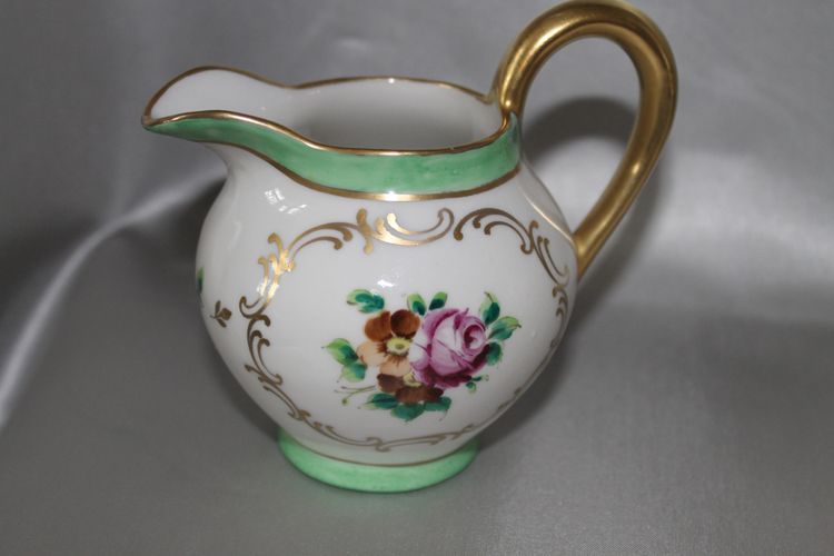 Part of a Samson porcelain tea service: teapot, sugar bowl, milk jug