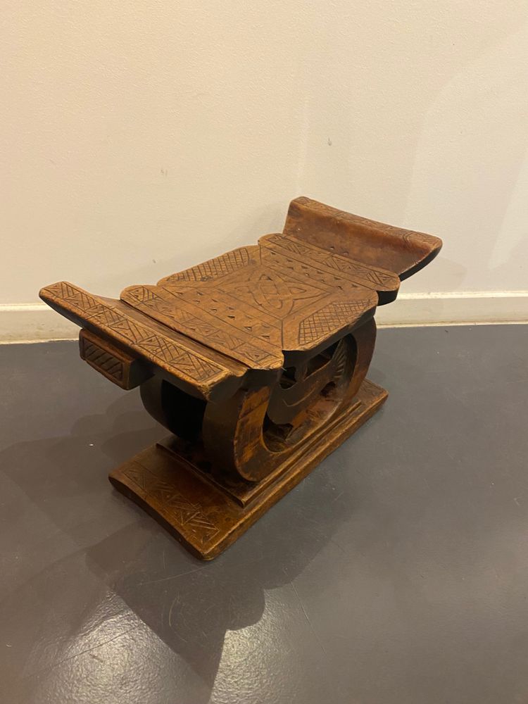 Ashanti stool with Sankofa bird from Ghana