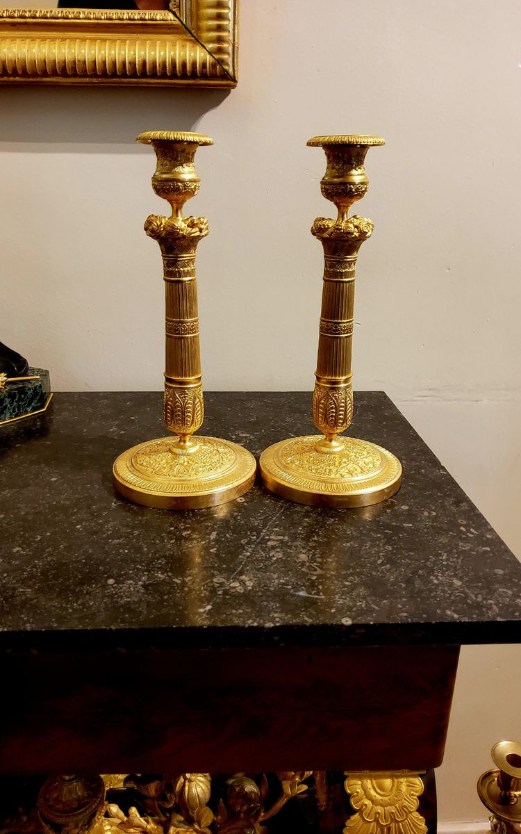Pair of gilded and chased bronze Flambeaux Restoration 19th century