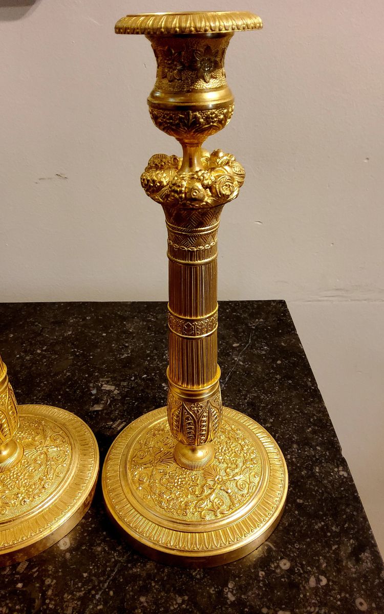Pair of gilded and chased bronze Flambeaux Restoration 19th century