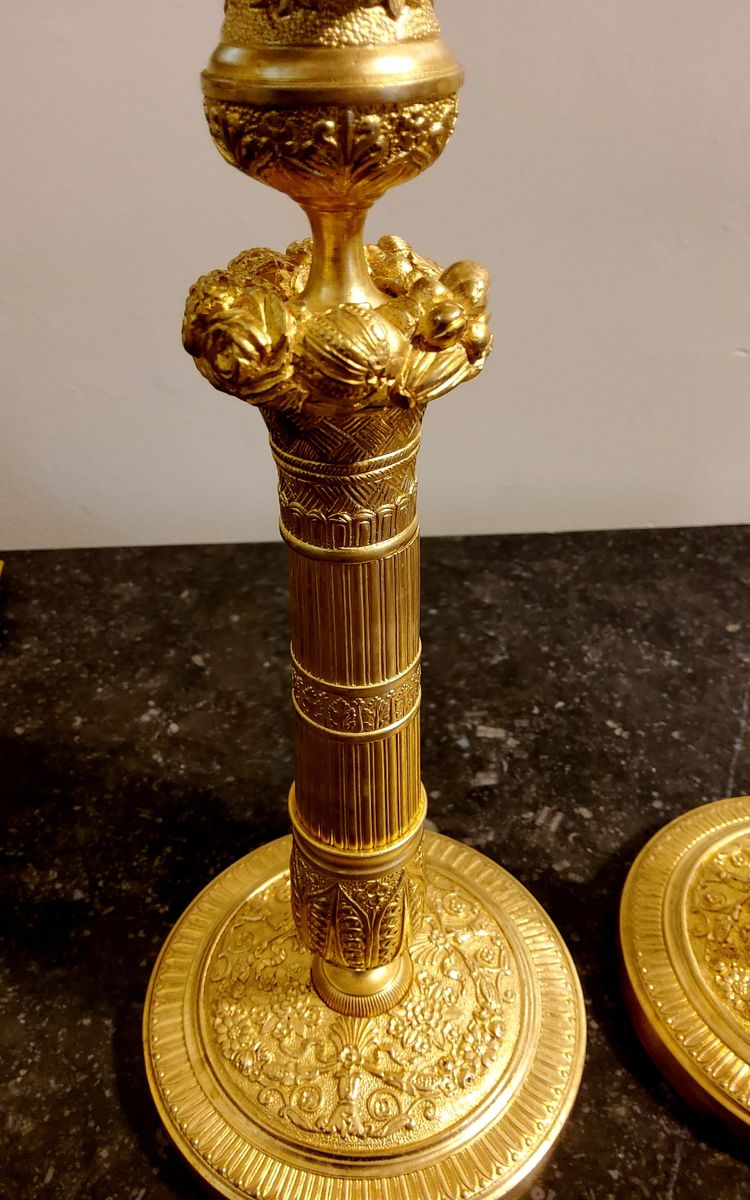 Pair of gilded and chased bronze Flambeaux Restoration 19th century