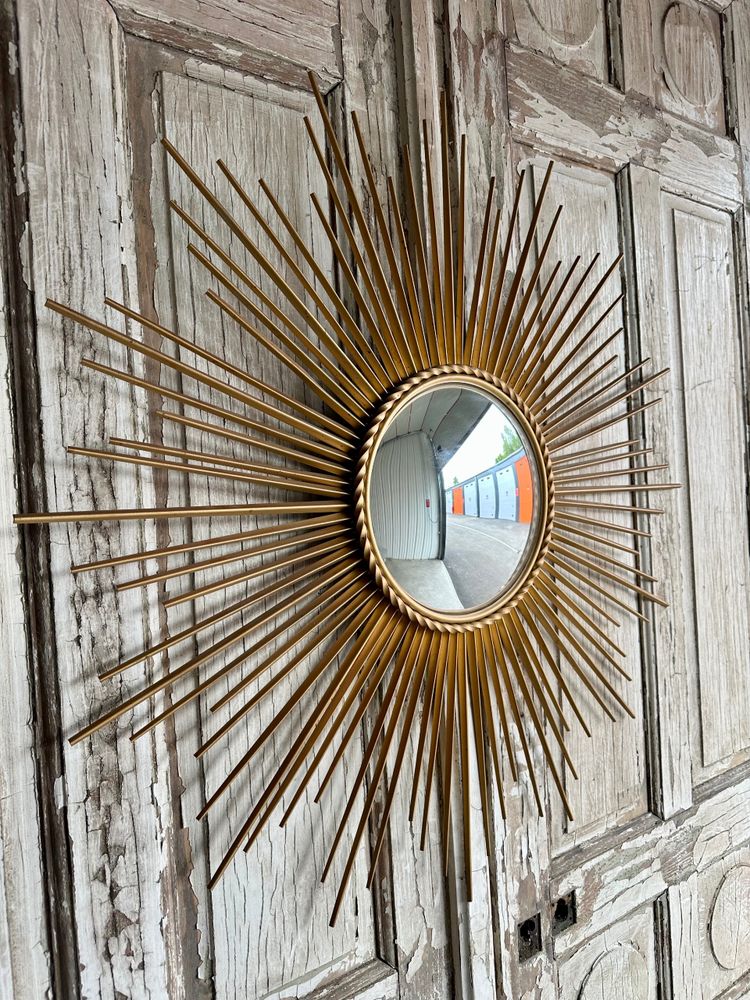 Miroir soleil en métal doré circa 1960