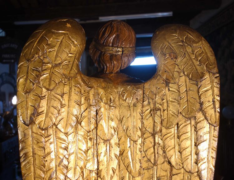 Large pair of gilded solid wood angels, 18th century