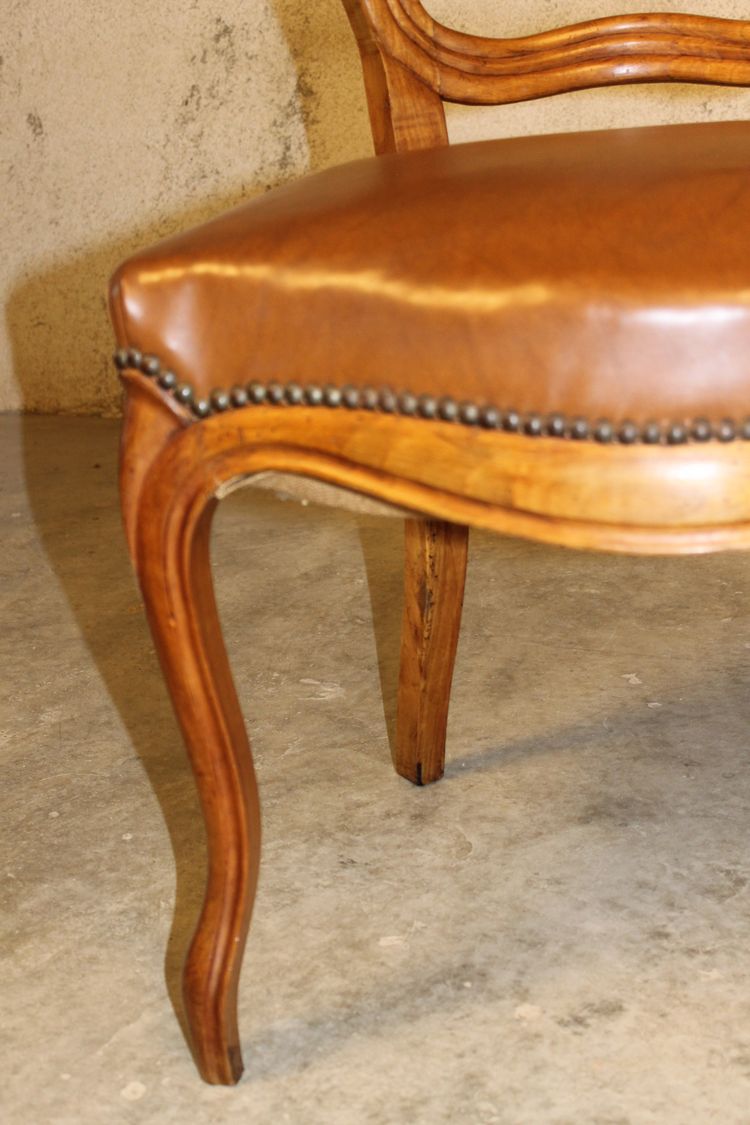 19th century Louis XV style walnut desk armchair upholstered in havana leather