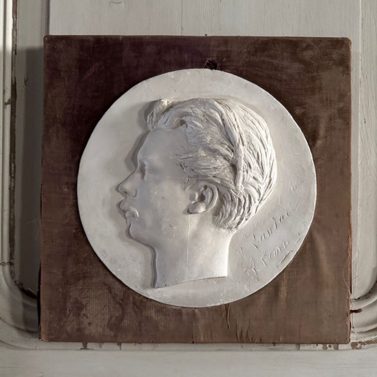 Plaster bas-relief of a man with a mustache from the 19th century, velvet frame
