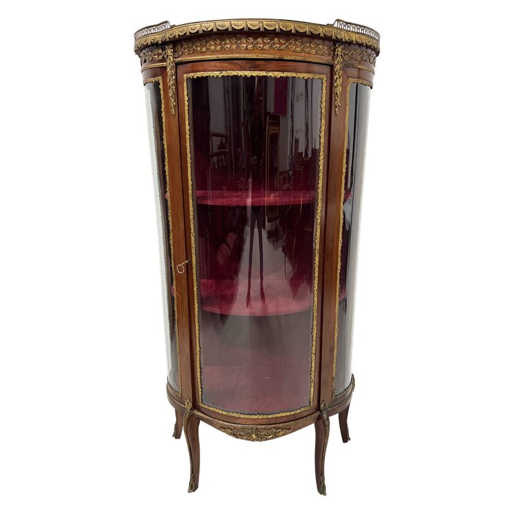 Napoleon III-style display cabinet in mahogany and veneer It opens with a curved glass door on the front.