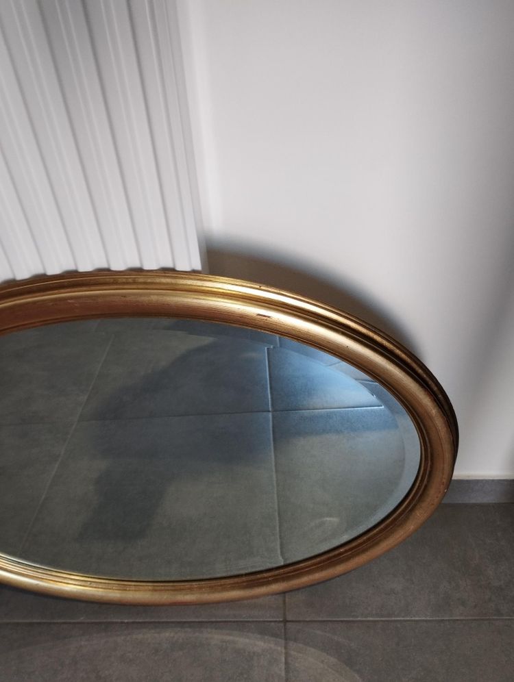 Miroir ovale doré 