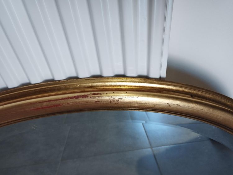 Miroir ovale doré 