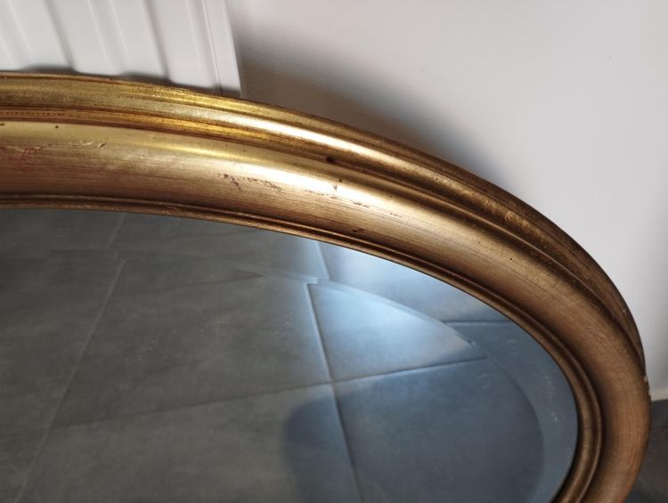 Miroir ovale doré 