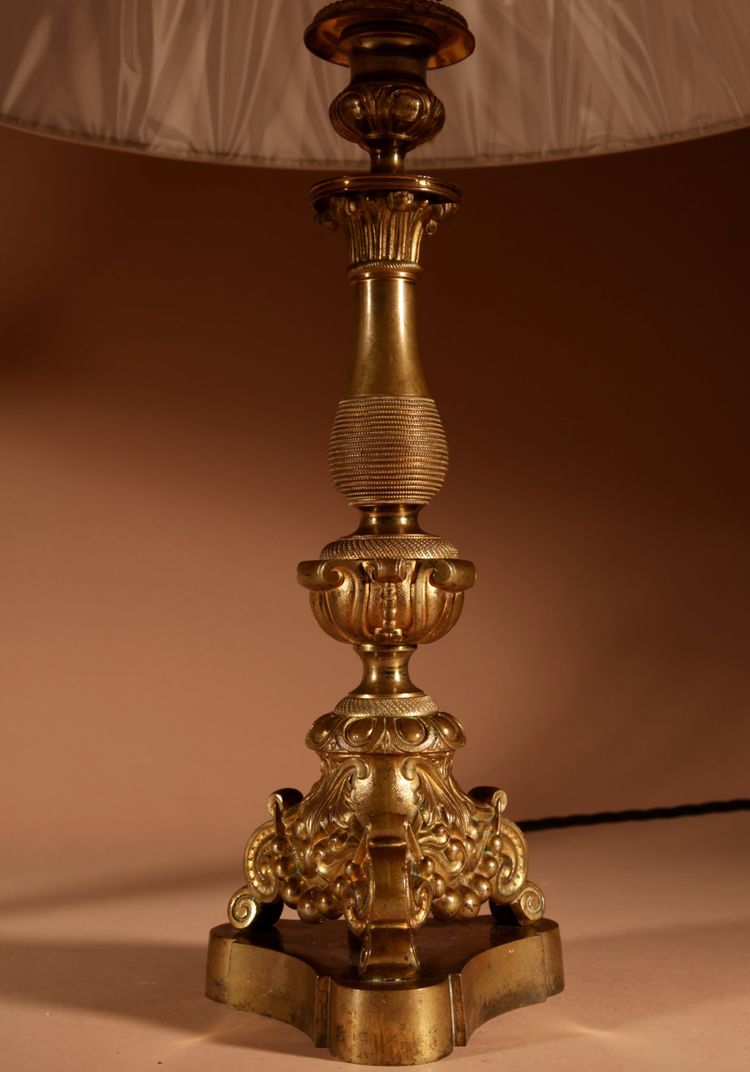 Pair of original table lamps in cast brass.