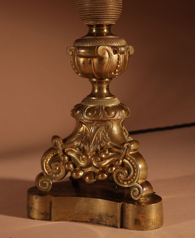 Pair of original table lamps in cast brass.