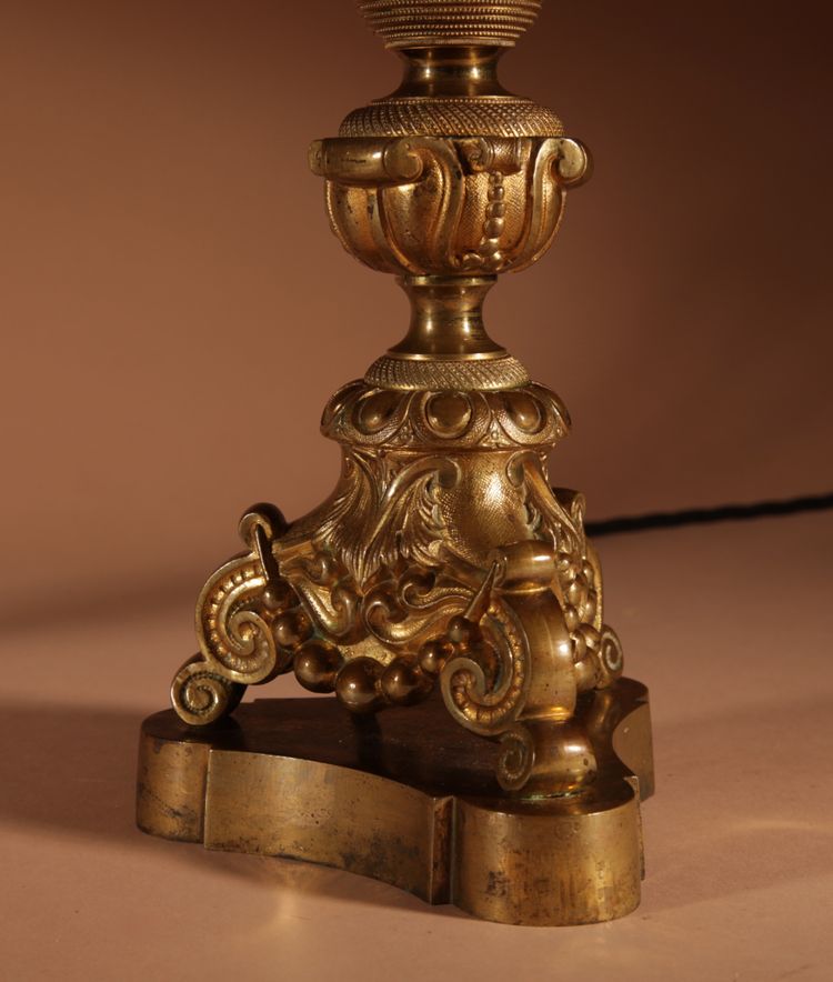 Pair of original table lamps in cast brass.